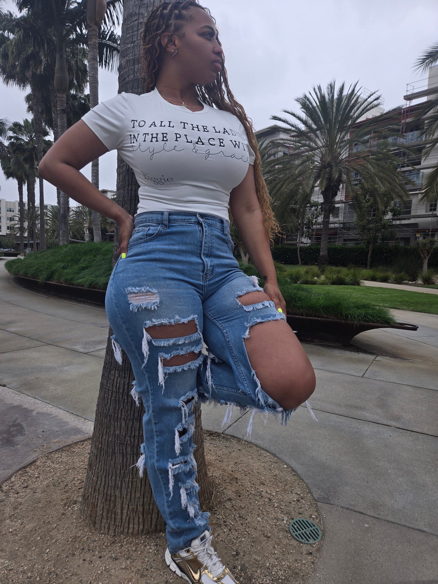 SAVAGE" high waisted distressed jeans